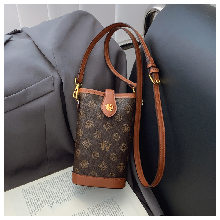 High sense fashion bucket bag female new presbycusis cylinder bag mobile phone bag all shoulder slant cross bag 2025