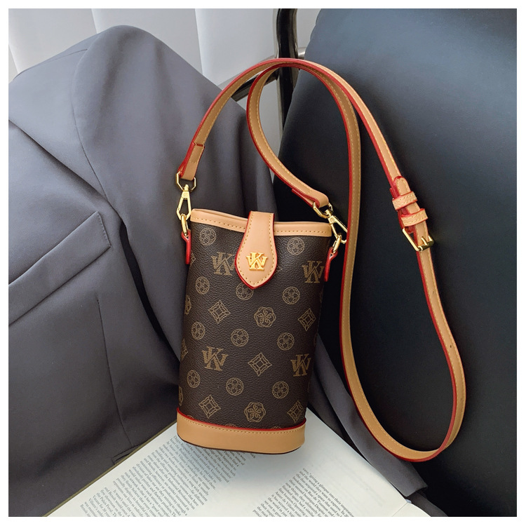 High sense fashion bucket bag female new presbycusis cylinder bag mobile phone bag all shoulder slant cross bag 2025