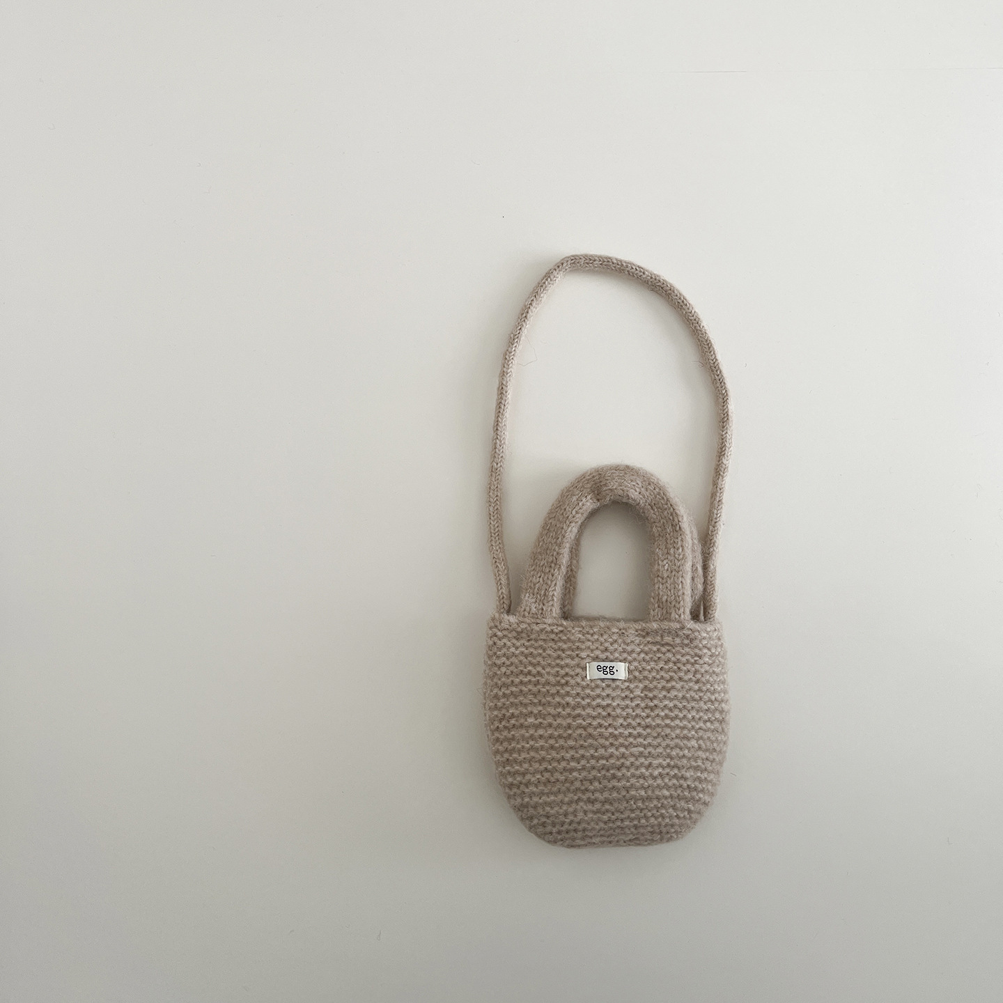 New Korean children's bag designer hand-held knitted small bag, children's candy color