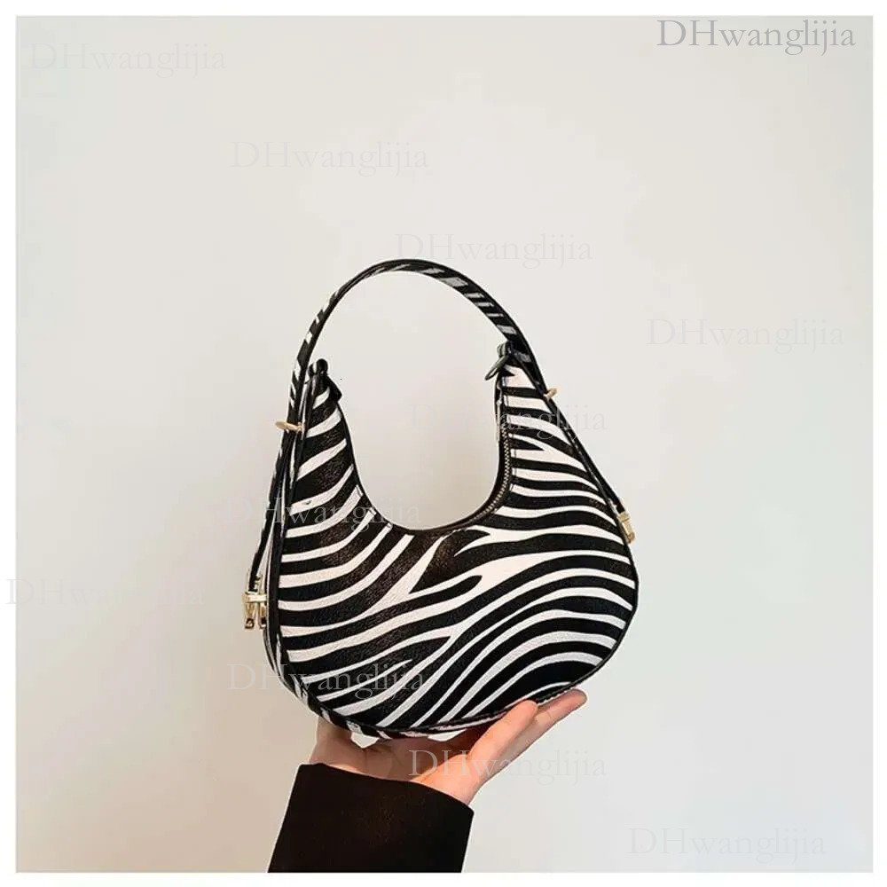 DHGM 2024 New Design Women Zebra Crossbody Bag Shoulder bag Fashion Stylish Elegant Classic design Natural Minimalist style c6a3