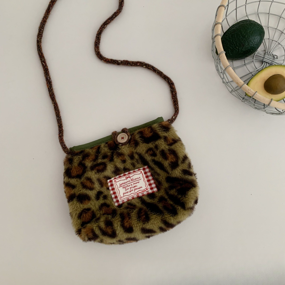 New Korean children's fashion letter designer logo leopard print shoulder bag autumn and winter girl baby concave cat step plush crossbody bag