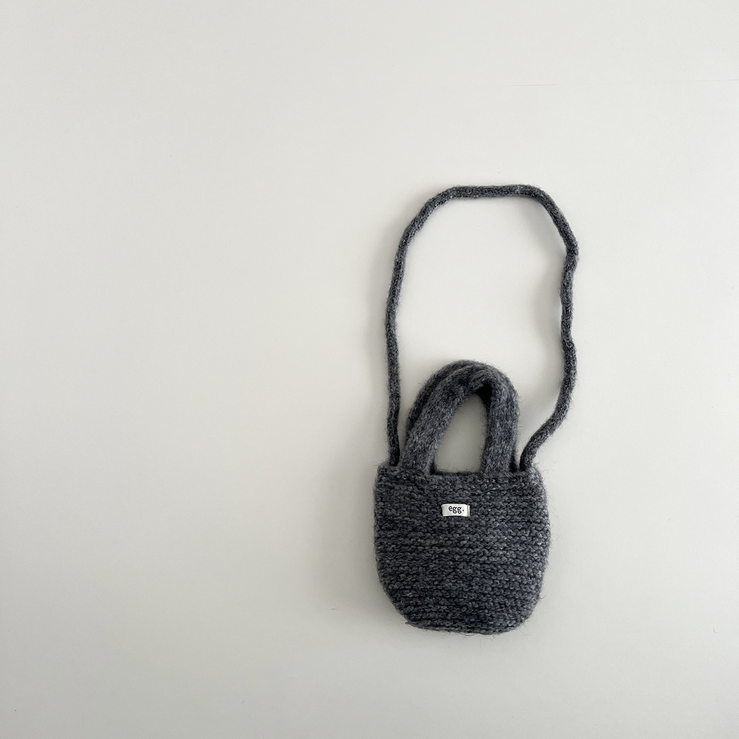 New Korean children's bag designer hand-held knitted small bag, children's candy color