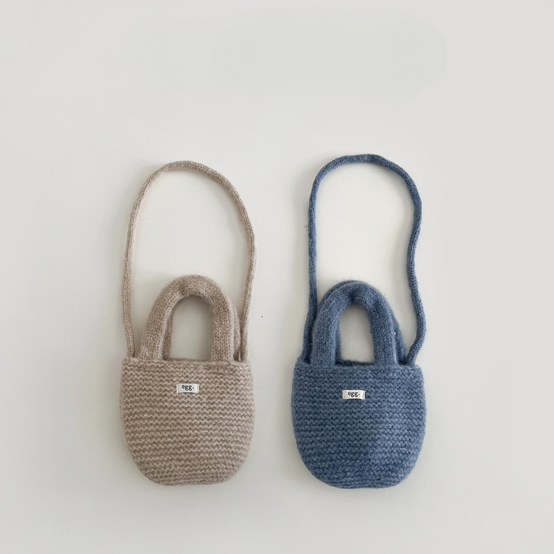 New Korean children's bag designer hand-held knitted small bag, children's candy color