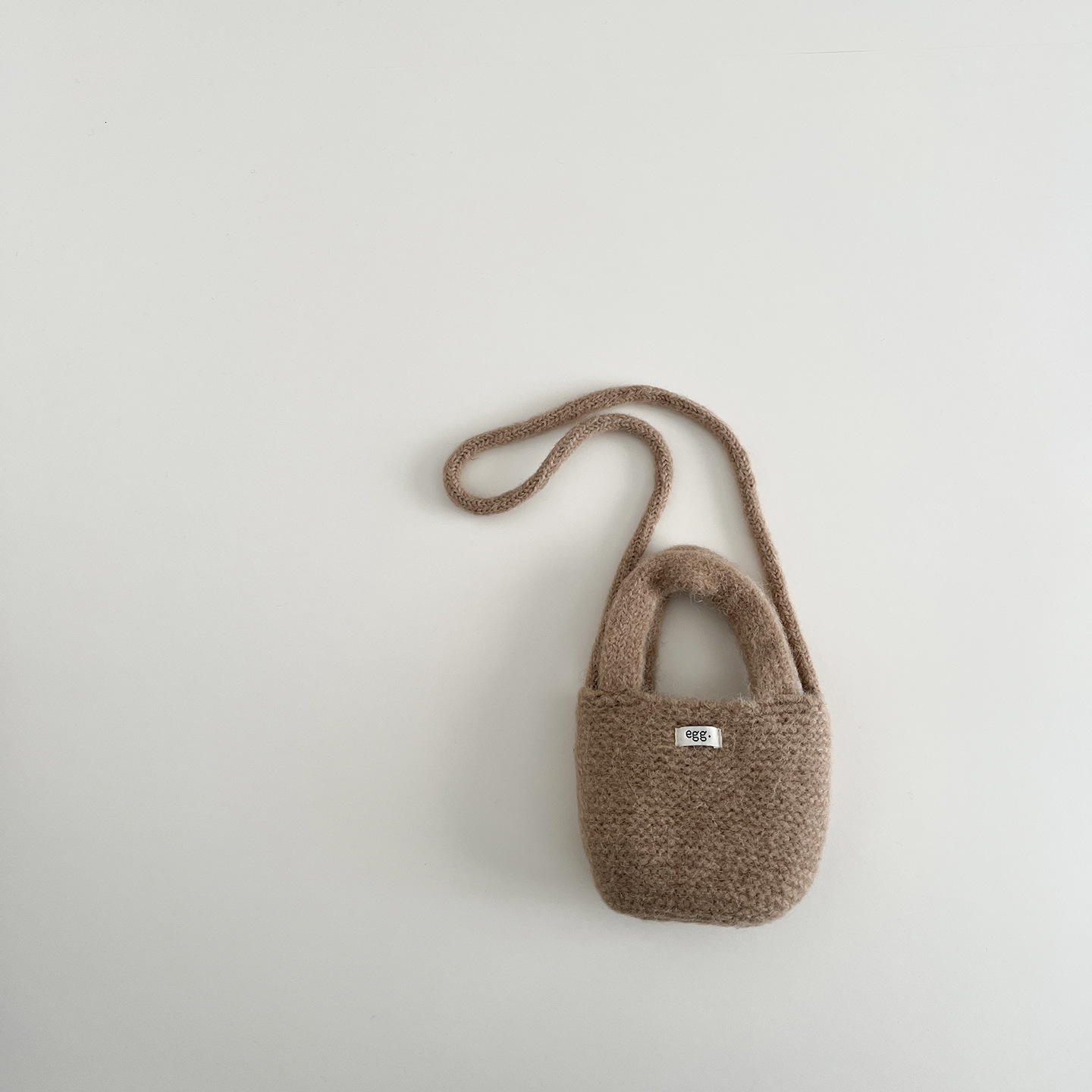 New Korean children's bag designer hand-held knitted small bag, children's candy color
