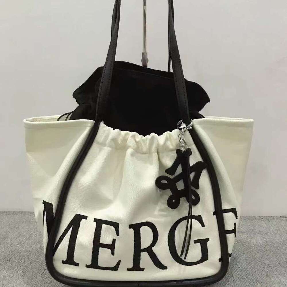 Designer's premium suede tote bag - Brand embossed design, a must-have for elegant and practical handbag series