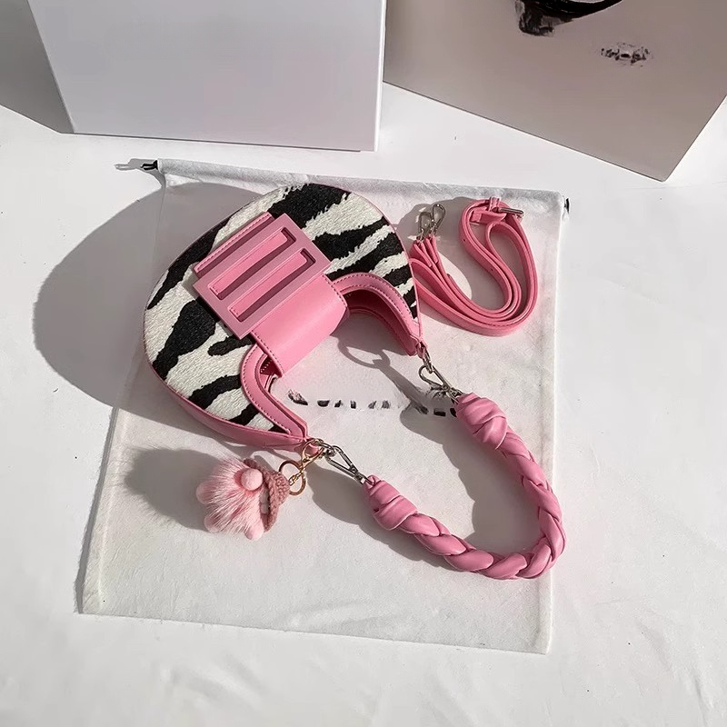 Designer's new zebra patterned horsehair women's armpit bag for autumn and winter, single shoulder crescent shaped rectangular bag