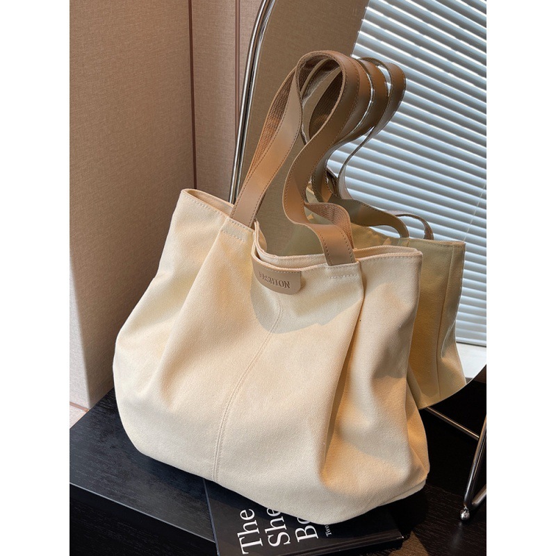 Designer ladies' large capacity canvas bag, fashionable new style, casual single shoulder tote bag, student class commuting tote bag