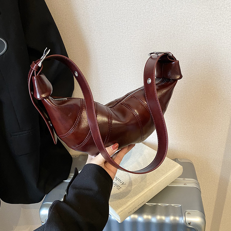 Free shipping designer bag New Autumn Winter Trendy Fashion Saddle Bag for Women Versatile Shoulder Crossbody Dumpling Bag