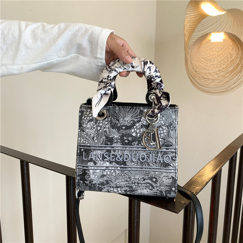 Free shipping designer bag New Style Women Embroidered Scarf Handbag High-end Fashionable Versatile Shoulder Crossbody Bag