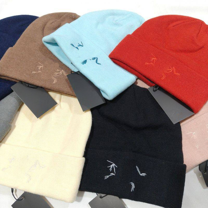 Designer Arc Knitted Beanie Hat with Fashion Embroidery for Winter Soft Thick Material Ideal for Outdoor Hiking and Daily Commute Comfort and Style