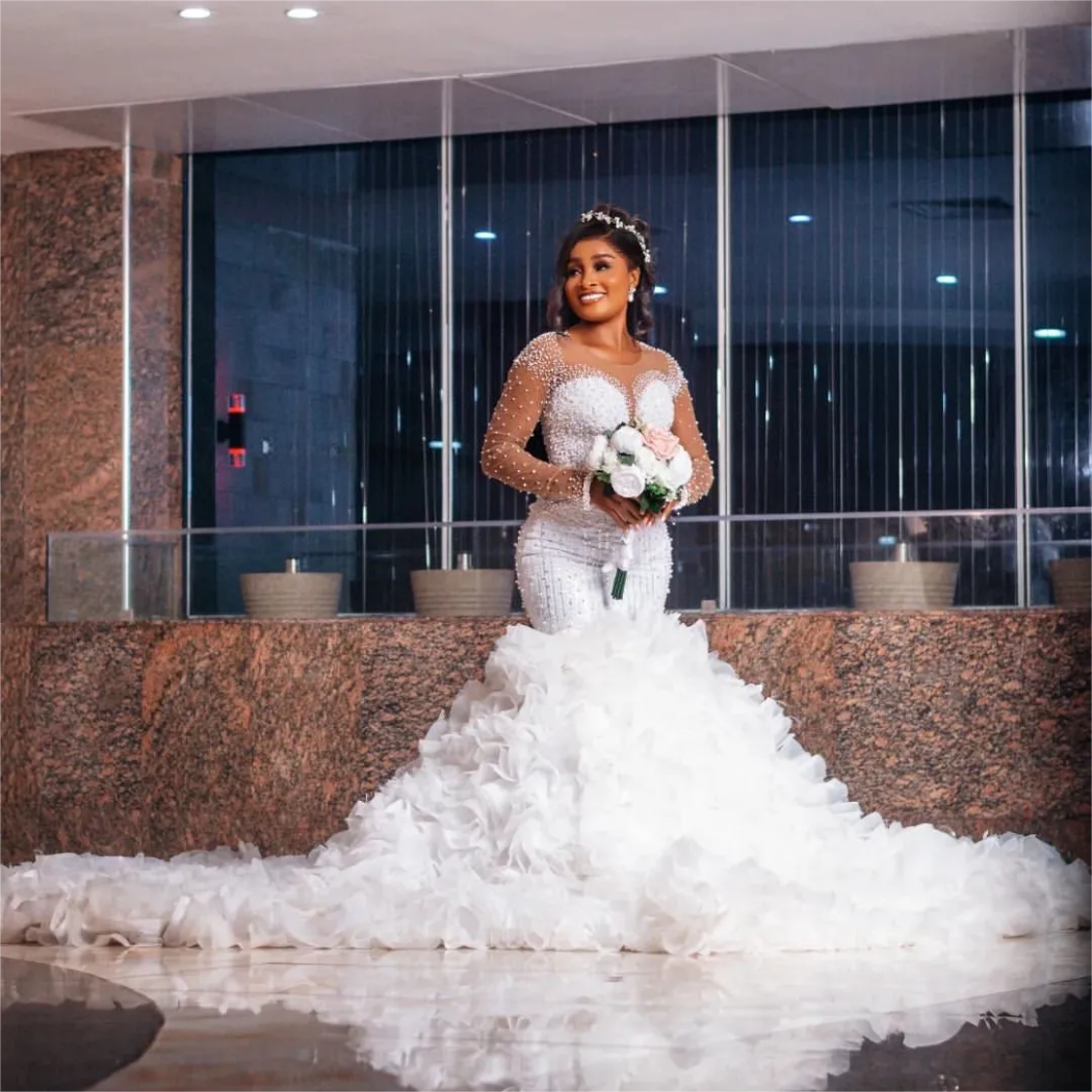 Arabic Aso Ebi Plus Size Mermaid Wedding Dress in Ivory with Full Lace Pearls Detachable Train and Full Sleeves