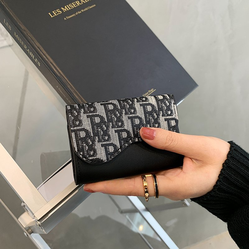 Luxury zero wallet hot selling European and American wallet women's short version 2025 new letter printed certificate bag card bag thin version n