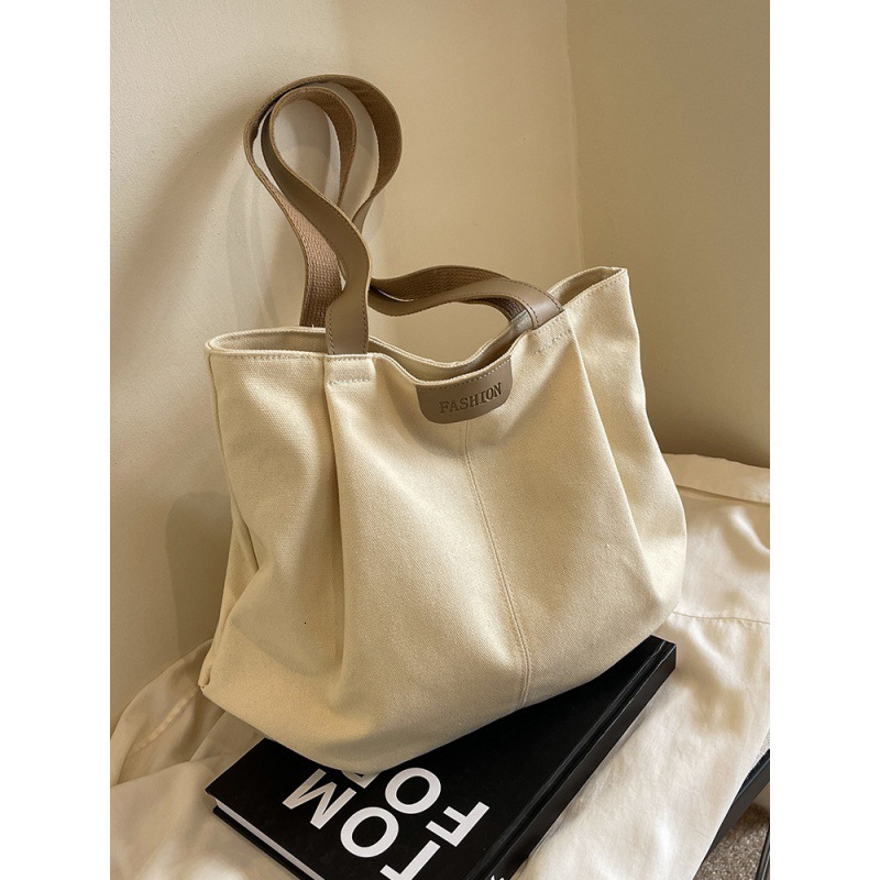 Designer ladies' large capacity canvas bag, fashionable new style, casual single shoulder tote bag, student class commuting tote bag