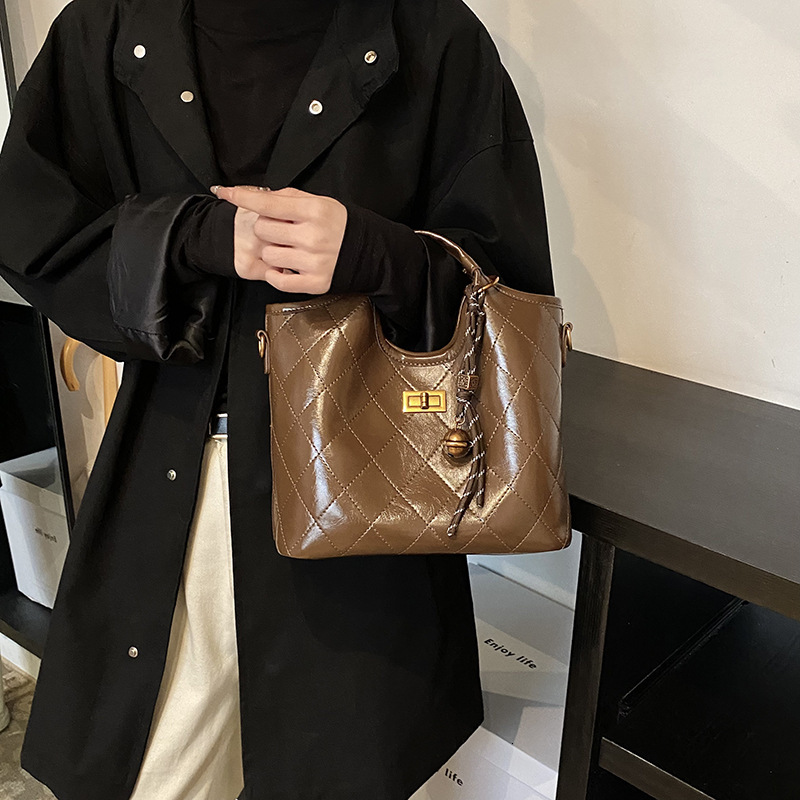 Free shipping designer bag High-end Quilted Bucket Bag for Women New Versatile Fashion Commuter Handbag Crossbody Tote Bag