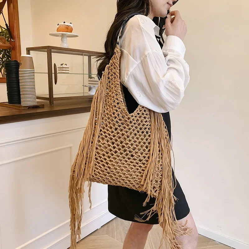 2025 Summer Tassel Shoulder Bags Hollow Out Weaving Tote Bags For Women Beach Vacation Handbags Travel Shoulder Bag 251027