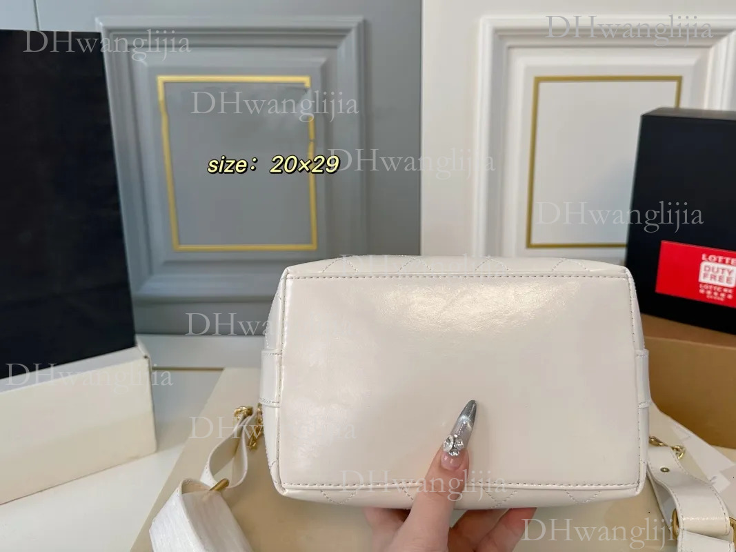 DHGM brand designer new hippie hobo bucket retro versatile pull rope chain tote can be cross-body daily commuting bag