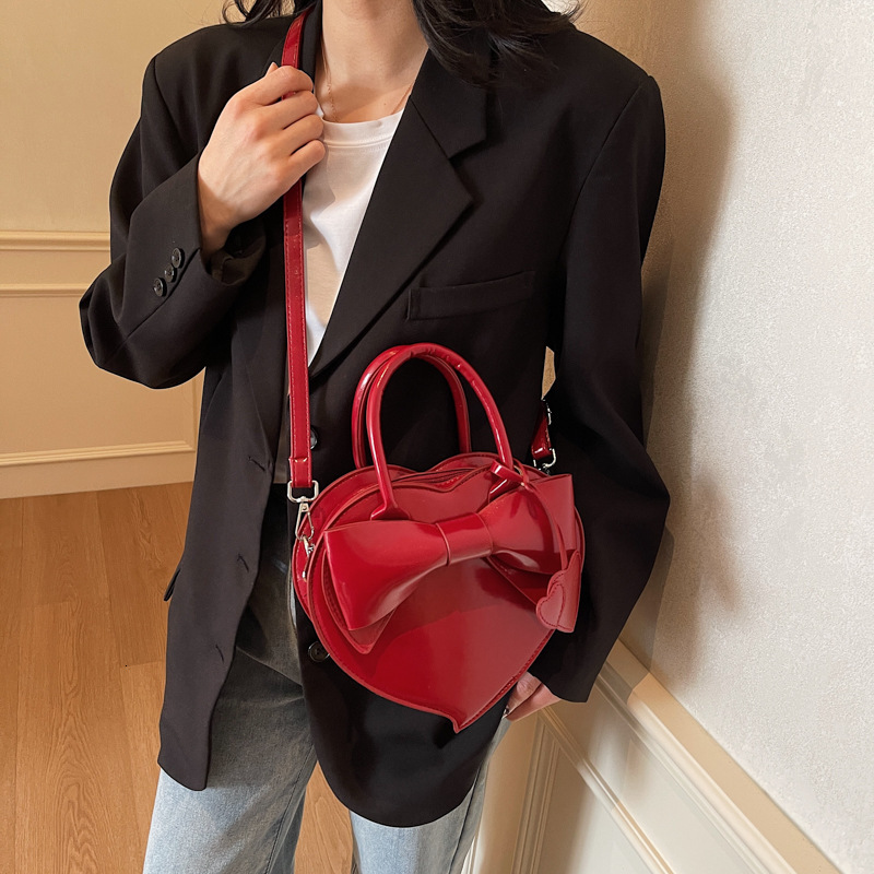 Free shipping designer bag High-end Bowknot Spring Summer New Cute Heart Bag Handheld Versatile Shoulder Crossbody Bag