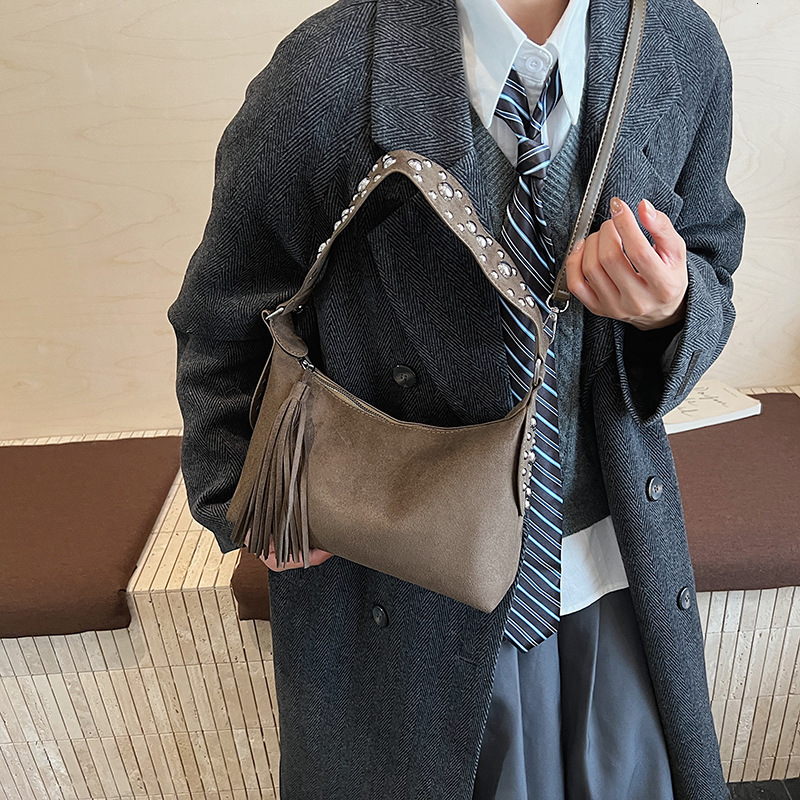 Free shipping designer bag Casual Large Capacity Underarm Bag New Rivet Suede Handbag Versatile Commuter Shoulder Bag