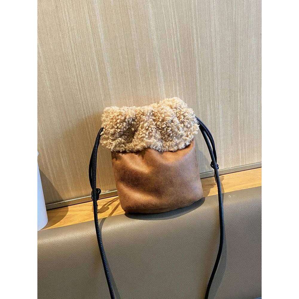 Designer Luxury Autumn And Winter Retro Drawstring Style Bucket Shaped Plush With Suede Roll Design Mini Crossbody Bag For Women