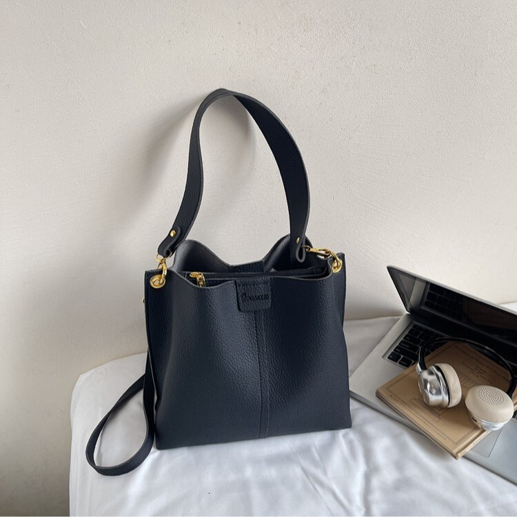 Free shipping designer bag Large Capacity Bucket Bag for Women New Fashionable Autumn Versatile Wide Strap Shoulder Bag Simple Textured Crossbody Bag