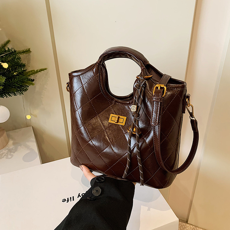 Free shipping designer bag High-end Quilted Bucket Bag for Women New Versatile Fashion Commuter Handbag Crossbody Tote Bag