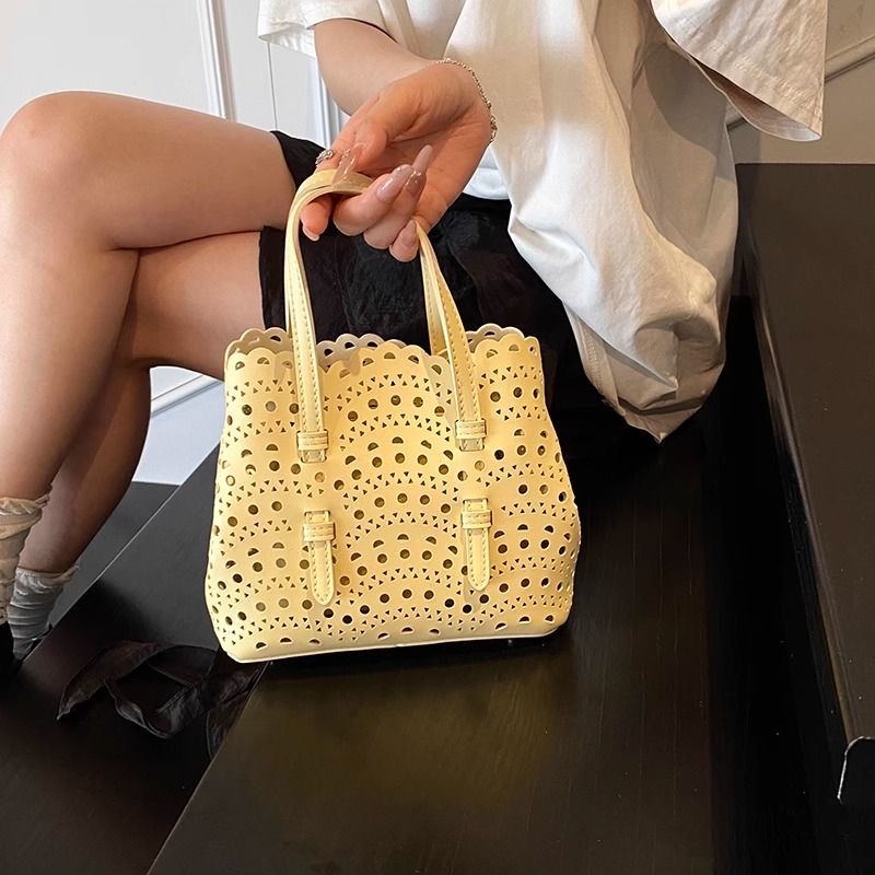 Chic Unisex Leather Clutch With Adjustable Straps & Unique Wave Embossing