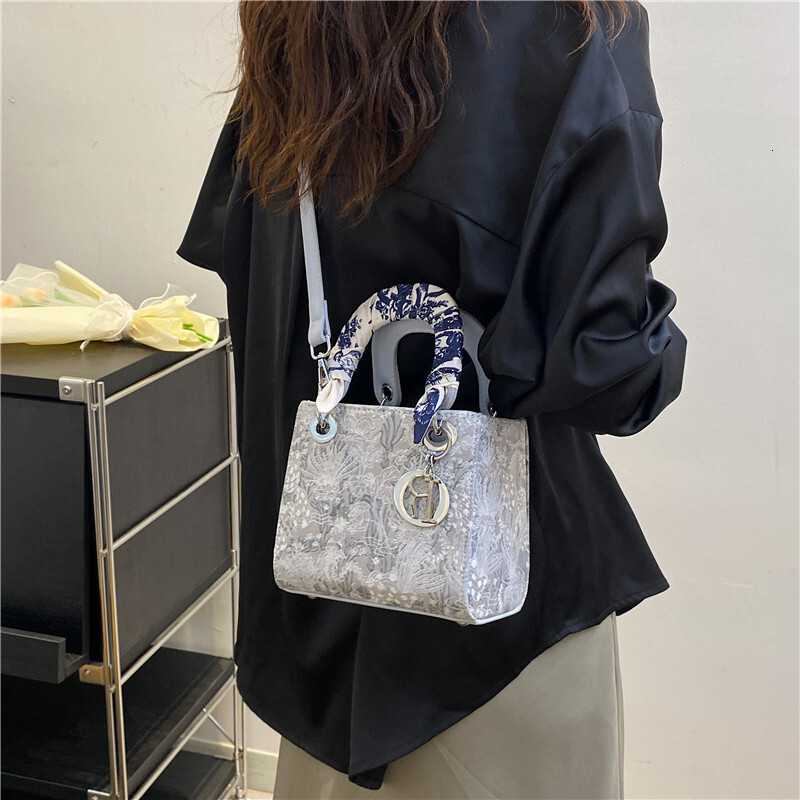 Free shipping designer bag New High-End Heavy Craft Silk Scarf Handheld Tote Fashion Versatile Shoulder Crossbody Bag