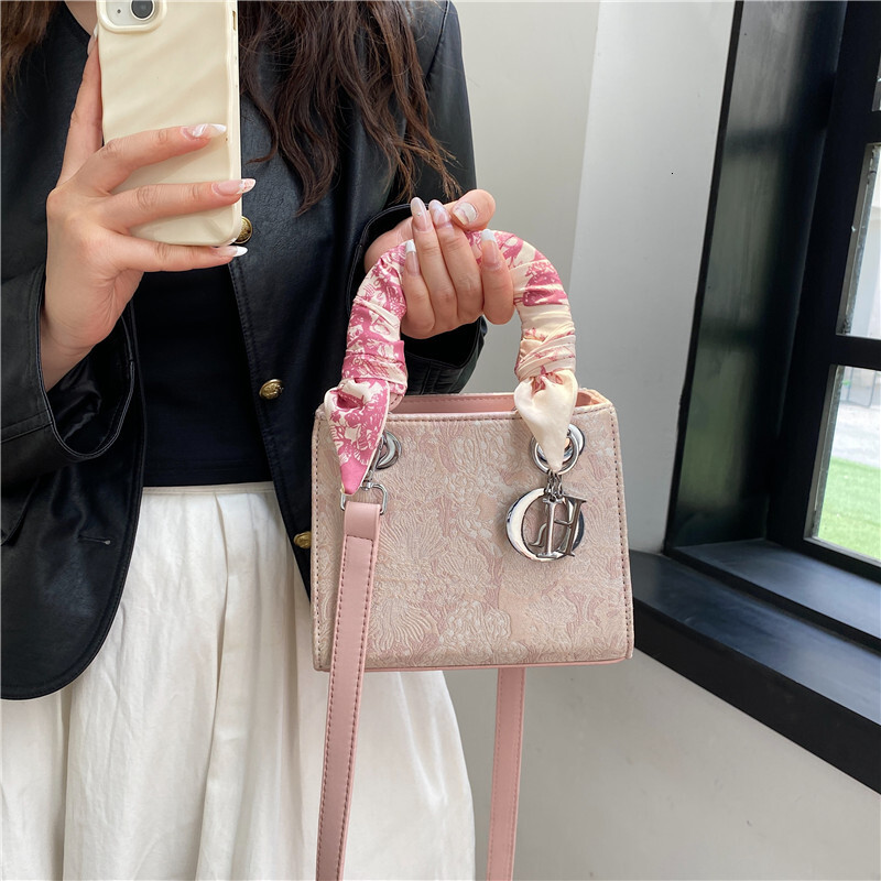 Free shipping designer bag New High-End Heavy Craft Silk Scarf Handheld Tote Fashion Versatile Shoulder Crossbody Bag