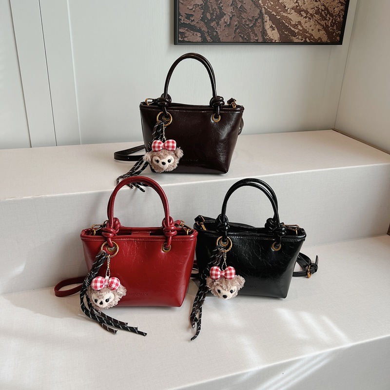 Free shipping designer bag New Autumn Winter Melad Bag for Women Versatile Handheld Shoulder Crossbody Bucket Bag