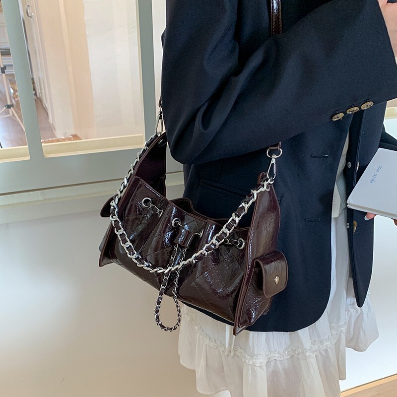 Free shipping designer bag Fashion Bag Quilted Chain Drawstring Shoulder Bag for Women Large Capacity High-end Fashionable Crossbody Bag