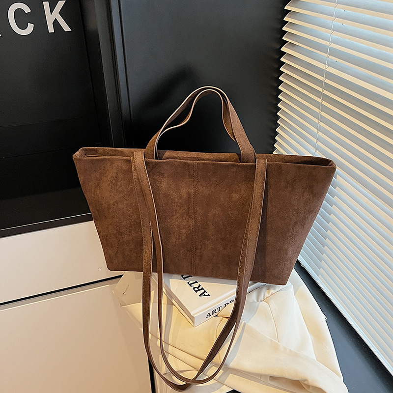 Free shipping designer bag Light Luxury Niche Handheld Tote Bag for Women Large Capacity Versatile Suede Commuter Shoulder Underarm Bag