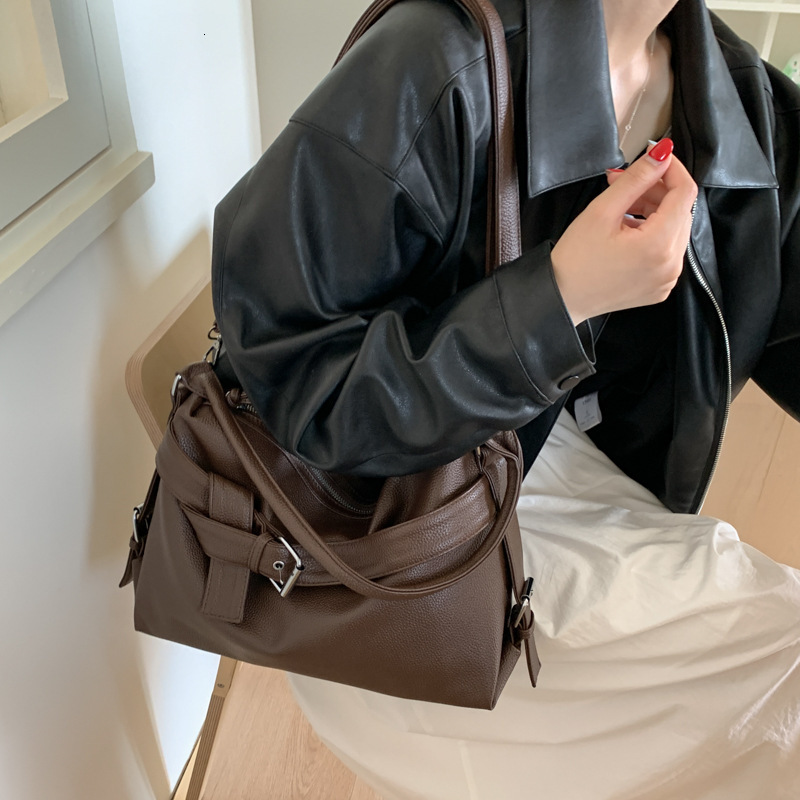 Free shipping designer bag Large Capacity Soft Leather Tote Bag with Buckle Design Stylish Motorcycle Bag Heavy-duty Single Shoulder Crossbody Bag