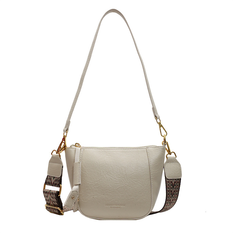 Free shipping designer bag Wide Shoulder Strap Bucket Bag for Women New Versatile Commuter Single Shoulder Crossbody Bag