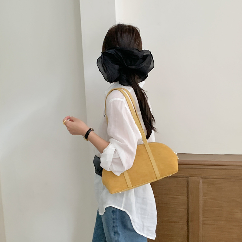 Designer's autumn and winter new hair stick bag, women's multifunctional shoulder bag, high-end large capacity commuting armpit bag