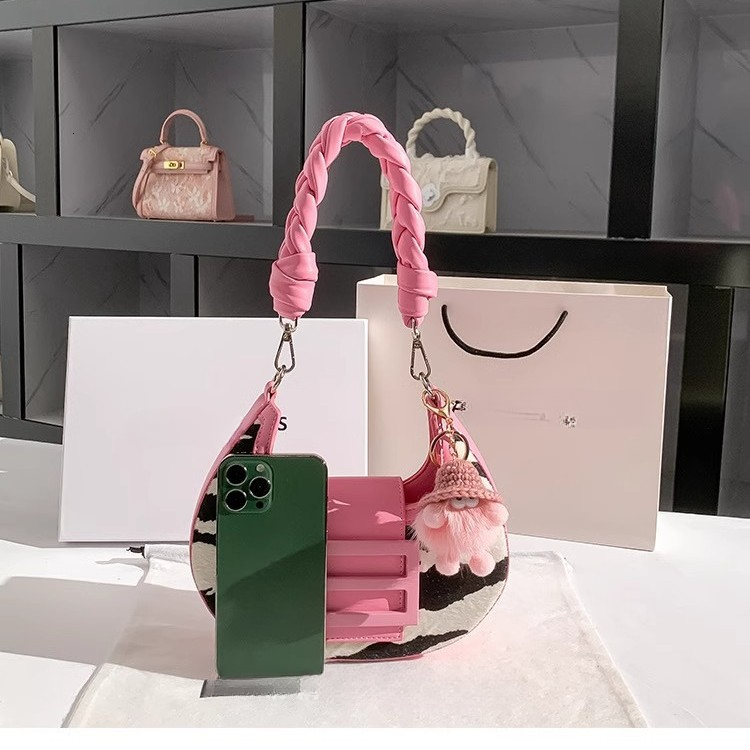 Designer's new zebra patterned horsehair women's armpit bag for autumn and winter, single shoulder crescent shaped rectangular bag