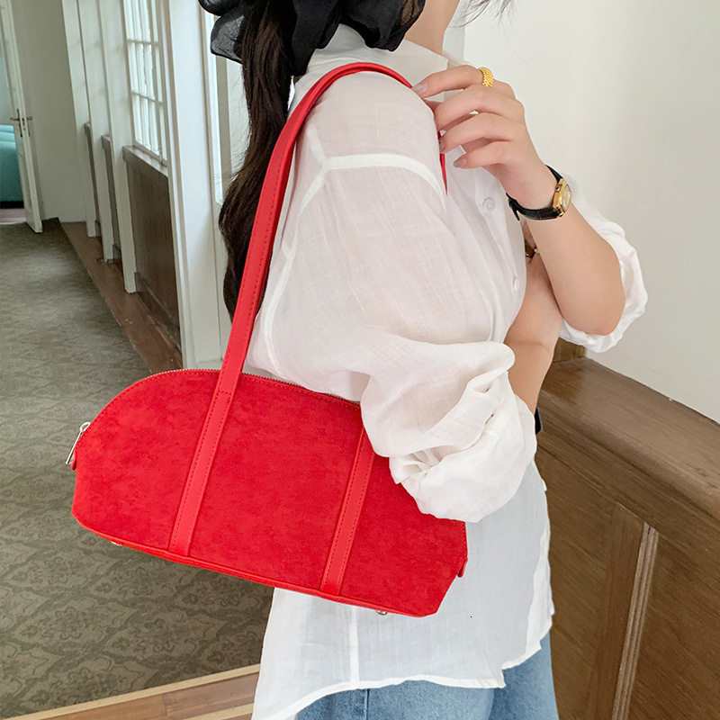 Designer's autumn and winter new hair stick bag, women's multifunctional shoulder bag, high-end large capacity commuting armpit bag