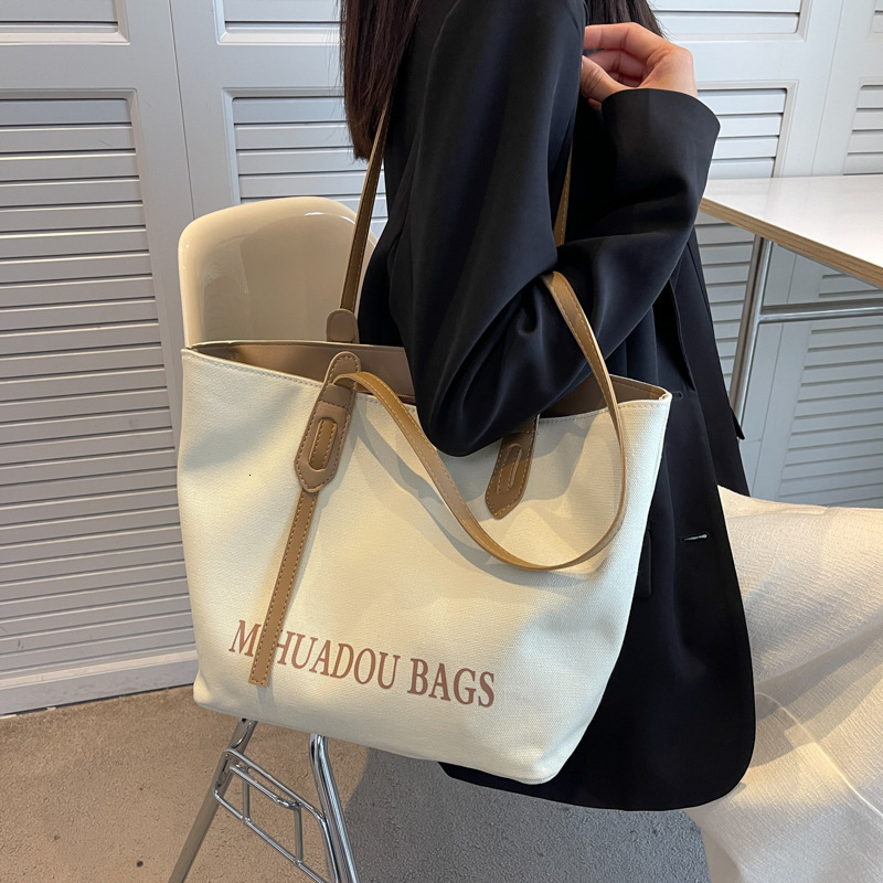Free shipping designer bag Large Capacity Canvas Bag for Women Spring and Autumn Casual Shoulder Bag College Student Commuter Bag Tote Bag Storage Bag