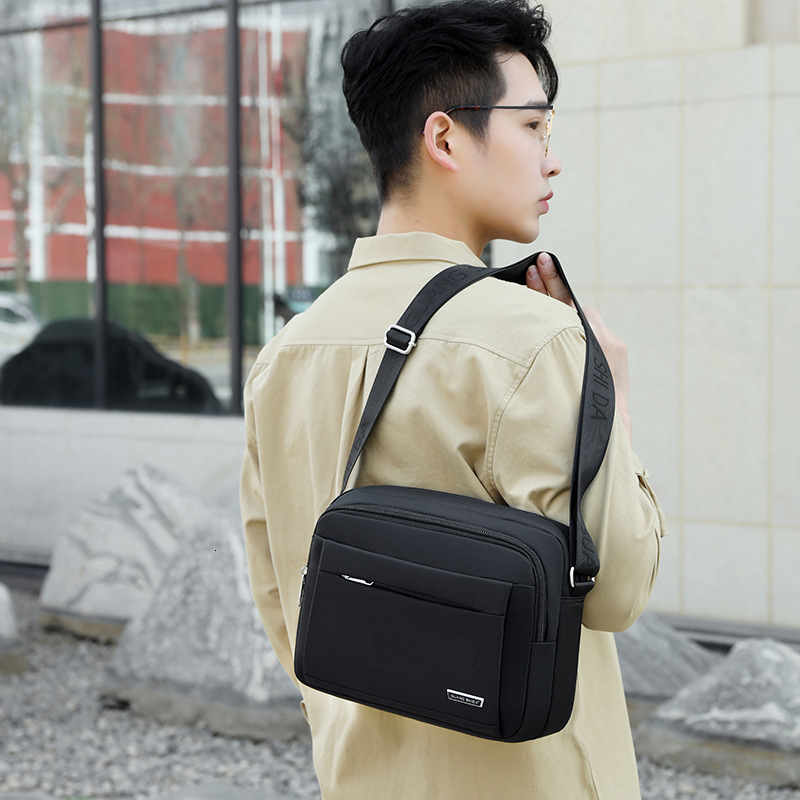 Designer luxury Men's Crossbody Bag Single Shoulder Bag Multi-layer Large Capacity Water-resistant Casual Cloth Bag Wallet Business Bag Customiza