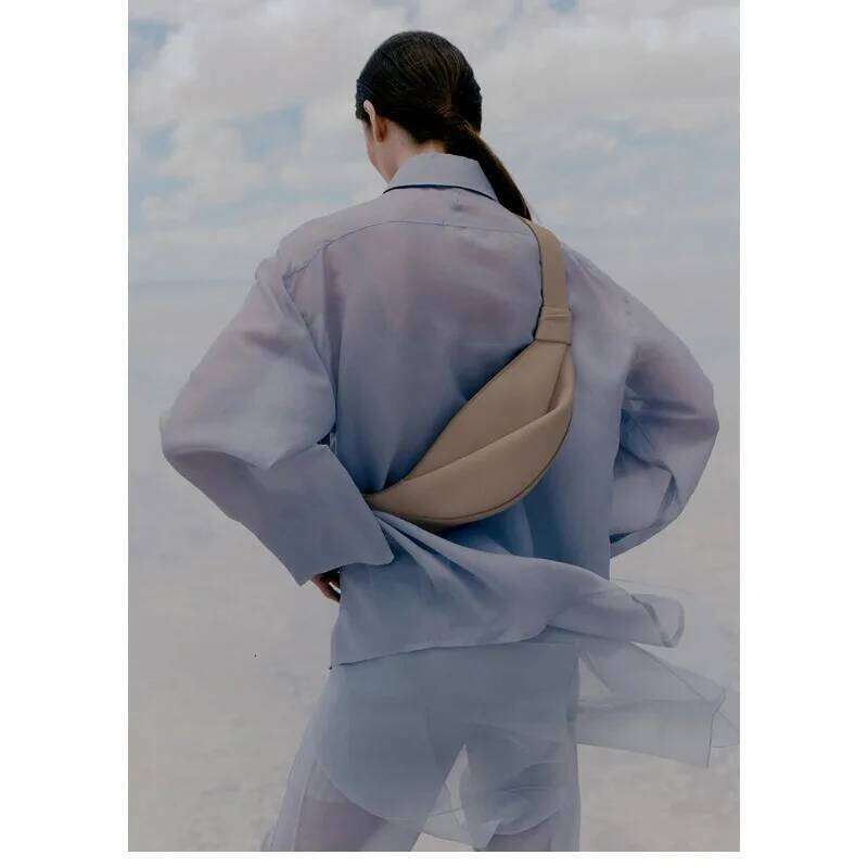 New Large Capacity Pillow Shaped Personalized Niche Travel Smooth Cowhide Crossbody Bag