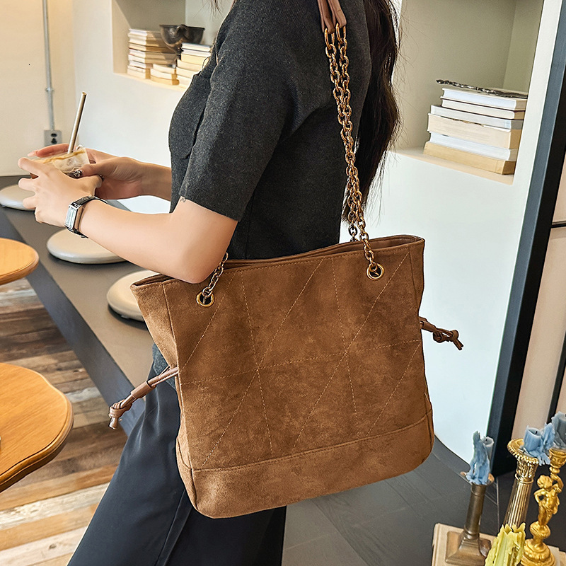 Free shipping designer bag Suede Single Shoulder Bag for Women New Versatile Tote Bag Commuting Large Capacity Drawstring Bucket Bag