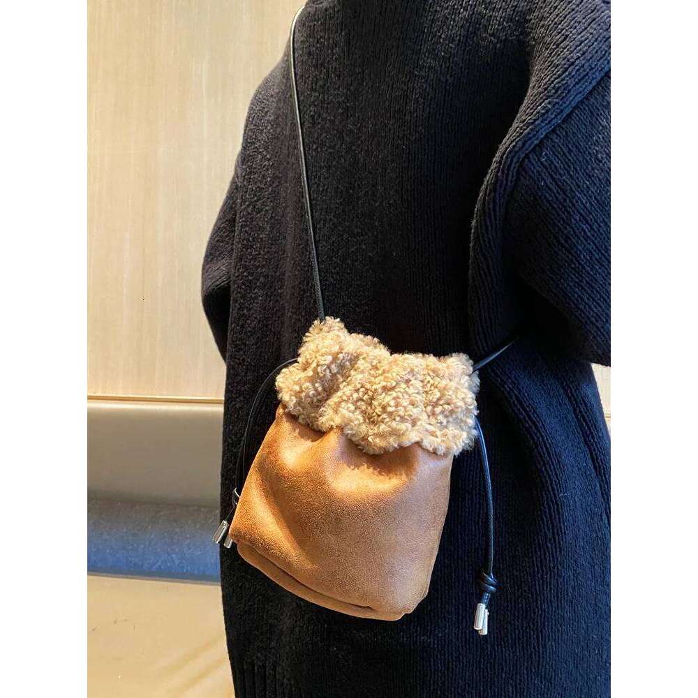 Designer Luxury Autumn And Winter Retro Drawstring Style Bucket Shaped Plush With Suede Roll Design Mini Crossbody Bag For Women