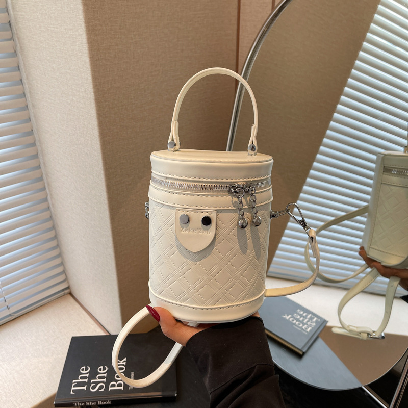 Free shipping designer bag High-end Niche Handheld Bucket Bag New Versatile Stylish Handbag for Women Commuting Single Shoulder Crossbody Bag