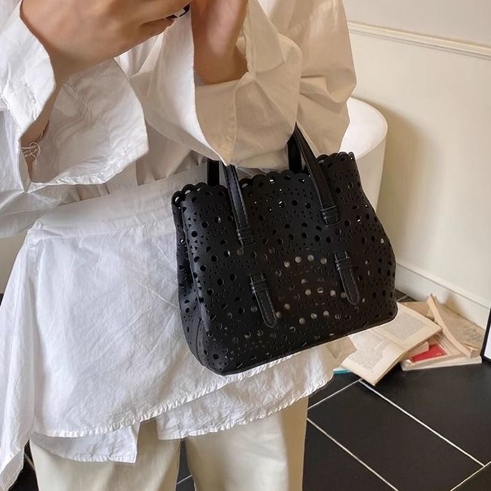 Chic Unisex Leather Clutch With Adjustable Straps & Unique Wave Embossing