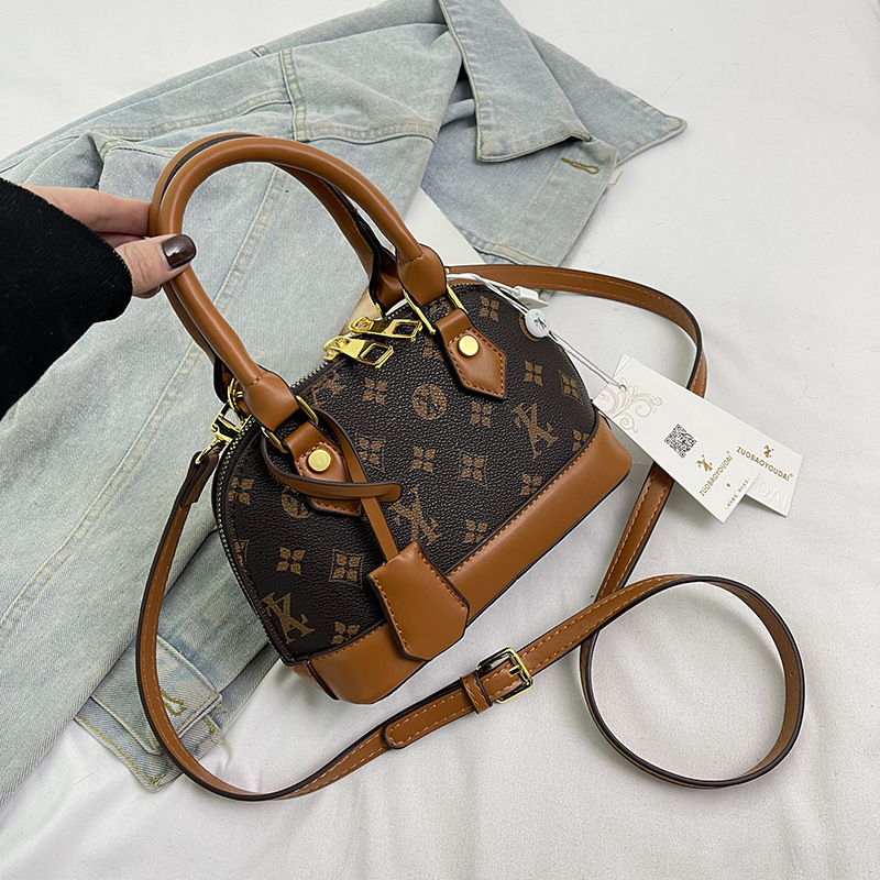 new Free Shipping Designer Bags Totes Fashion handbag women commuting printed casual bag