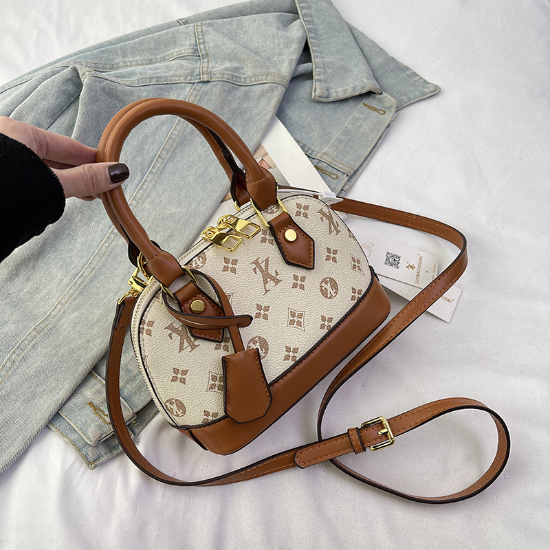 new Free Shipping Designer Bags Totes Fashion handbag women commuting printed casual bag