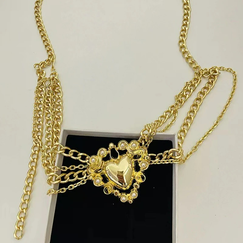 Fashion small fragrance multilayer golden heartshaped waist chain Celebrity style creative fringe belt chain dress accessories 251023
