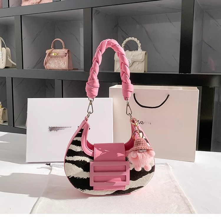 Designer's new zebra patterned horsehair women's armpit bag for autumn and winter, single shoulder crescent shaped rectangular bag