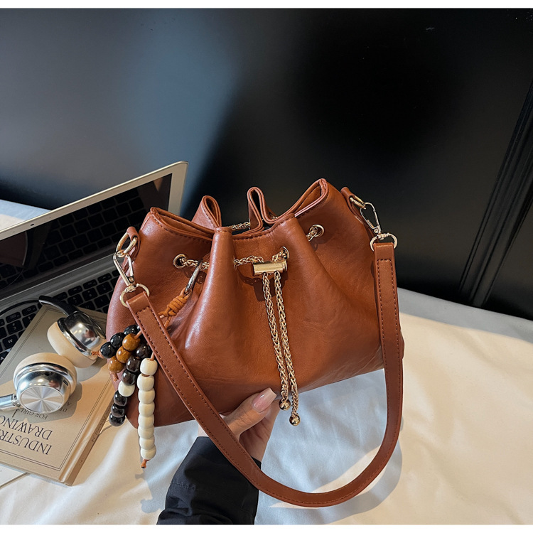 Free shipping designer bag Niche Design Drawstring Handheld Bucket Bag for Women New Autumn and Winter Fashion Commuter Shoulder Crossbody Bag