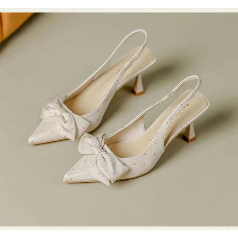 Sweet rhine bow hollow high heels womens stiletto heel French kickoff not tired foot temperament baotou sandals summerXJ251027