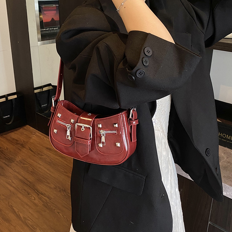 Free shipping designer bag High-end Underarm Bag New Niche Hot Girl Trendy Cool Single Shoulder Bag Rivet Motorcycle Crossbody Bag